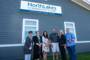 Reba Rice, NorthLakes Community Clinic CEO, Anna Ringstad, Senator Tammy Baldwin’s Northwestern Wisconsin Regional Representative, Kelly Martin, NorthLakes Peer Support Specialist, Romaine Quinn, State Senate Candidate, State Representative Gae Magnafici, and State Representative Dave Armstrong.