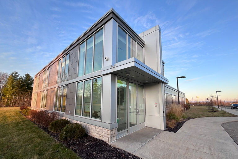 exterior of a building with a glass wall